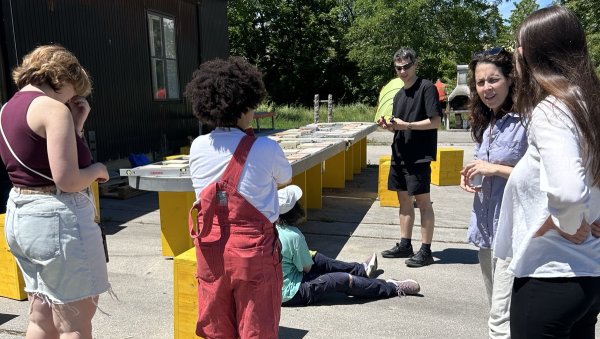 A photo of participants at the preparation seminar doing an outdoor activity.